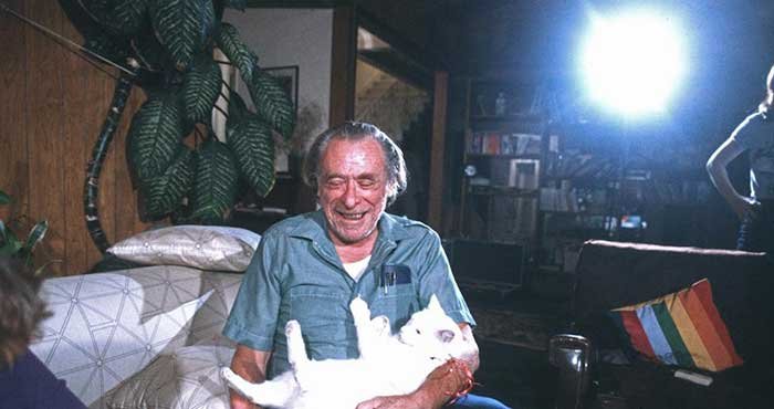 Charles Bukowski with his cat